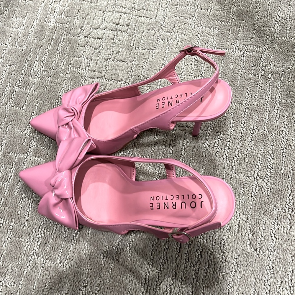 BRAND NEW - Very cute Patent Leather Pink Heels with Bow. Never worn.